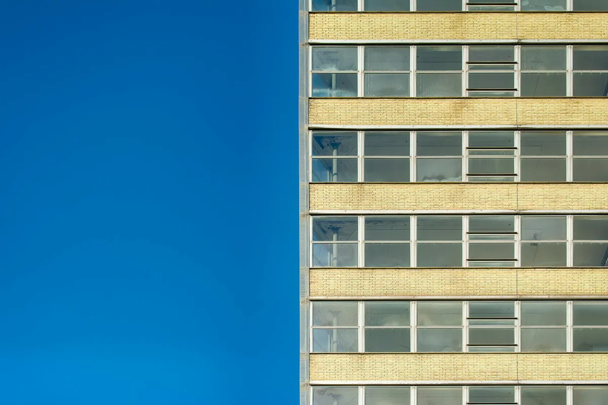 A Dutch regulatory authority building exterior in Den Haag